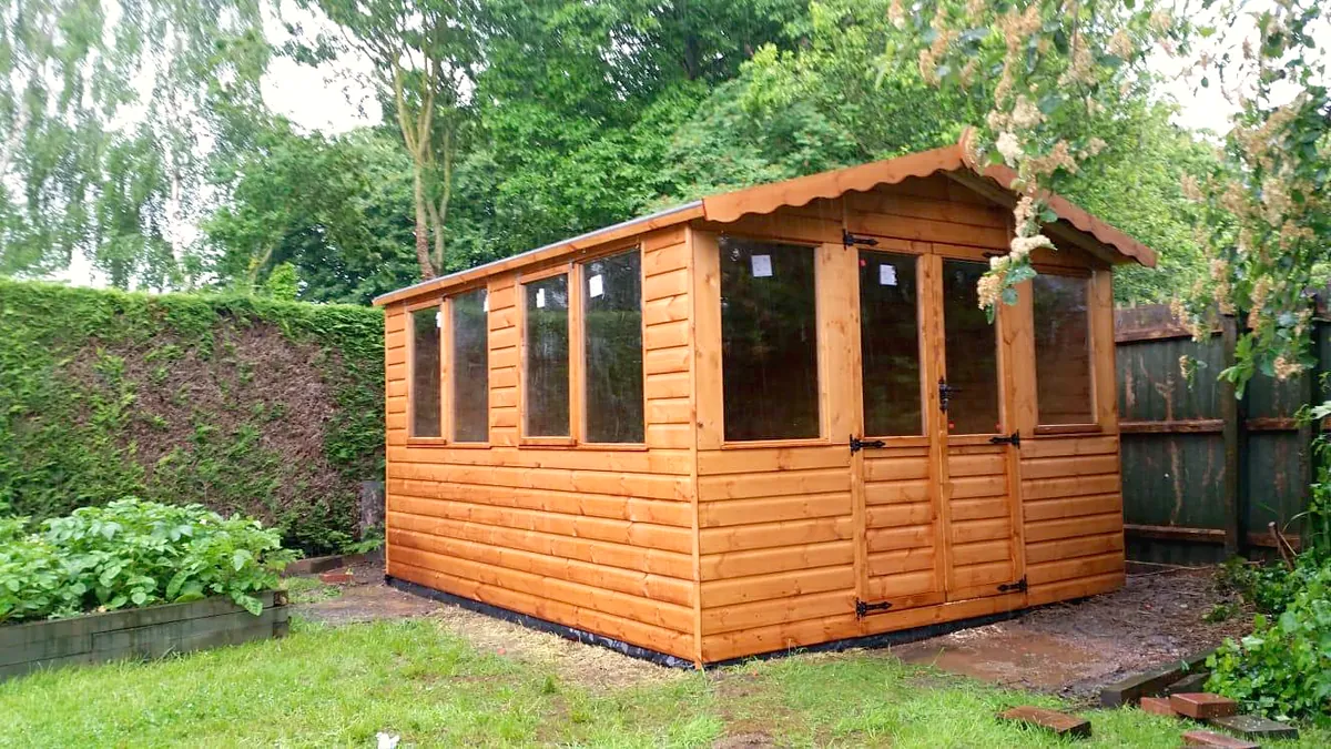 Apex roof garden office with double doors and windows