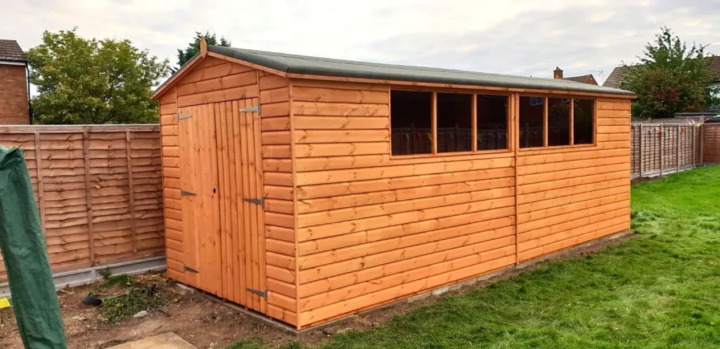 Long apex roof garden workshop with double doors