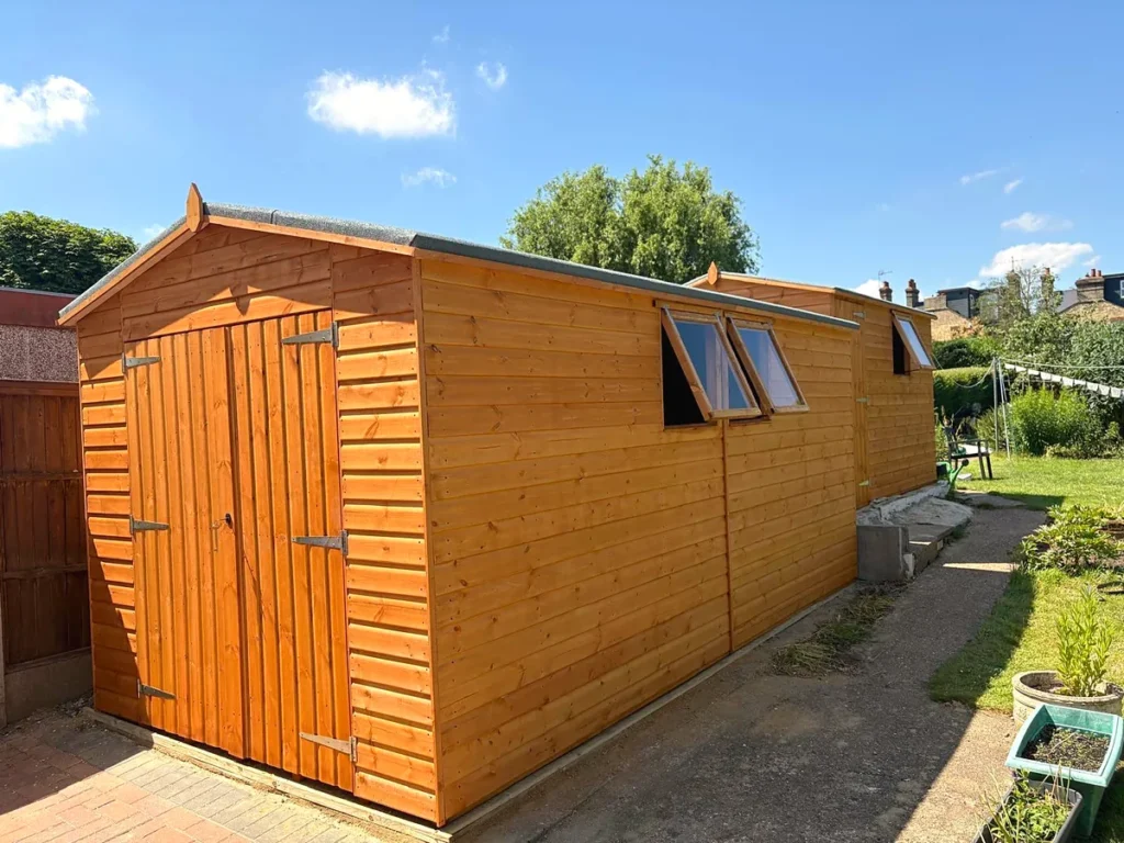 Garden workshop with double doors and windows
