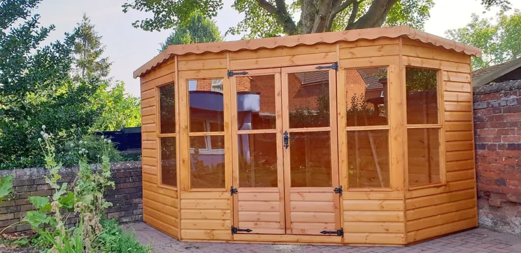 Corner summer house with double doors and windows, pent roof